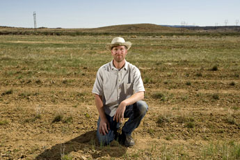 Steve Heil stands in the a field of organic Navajo tea, also known as greenthread tea. Heil has been farming the crop for almost 10 years and sells it locally. &copy; 2011 Gallup Independent / Brian Leddy 
